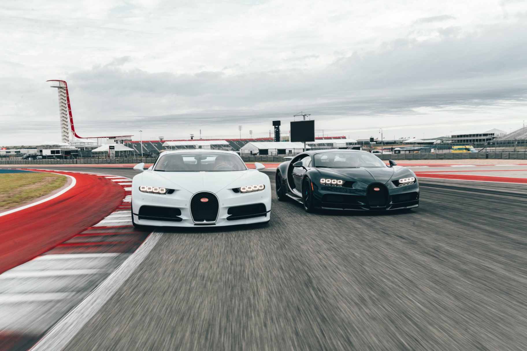 McLaren supercar at speed on race track